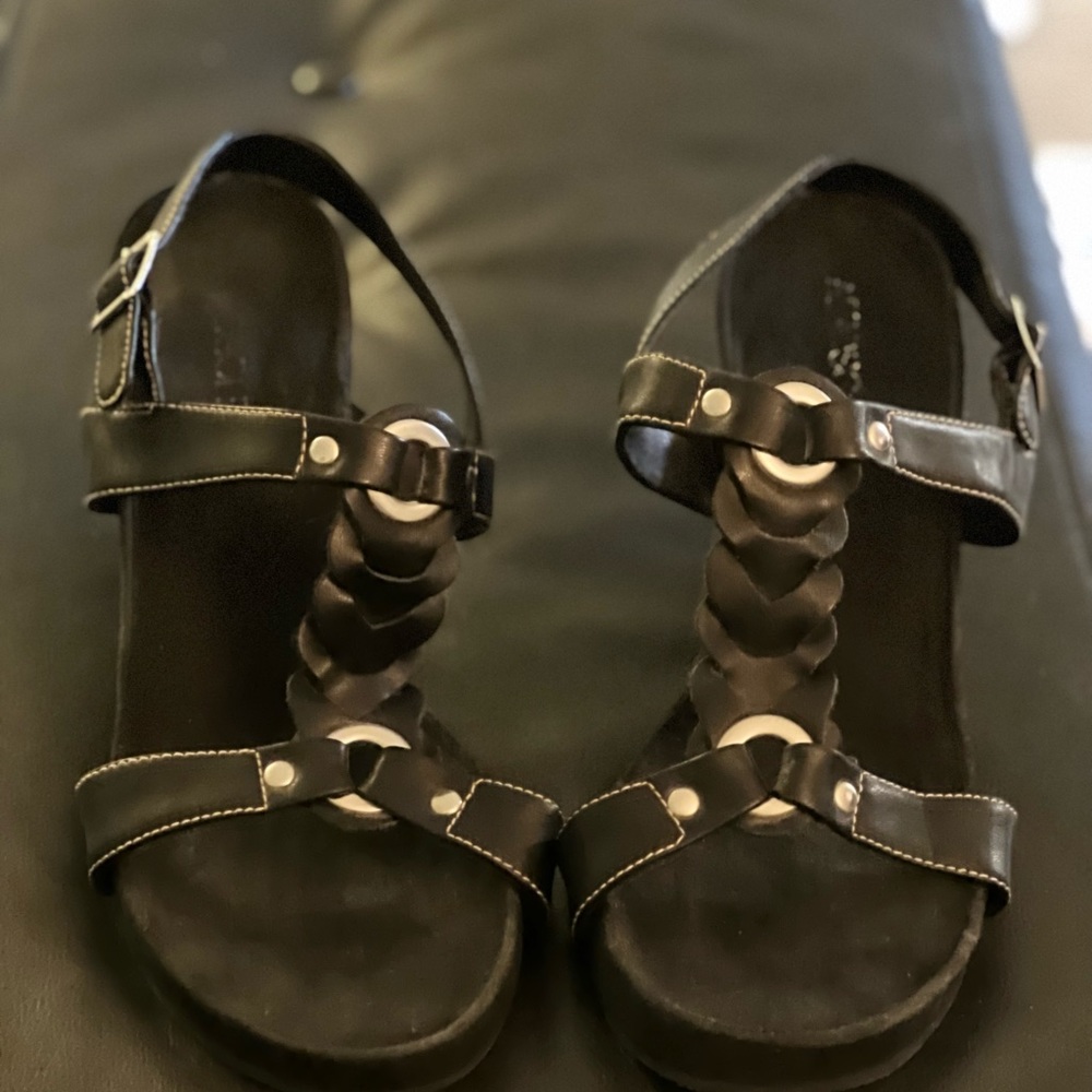 Aerosols, wedge heal with braided design. Gently worn.